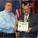 Mr. Mata receiving an award from Mayor Raul Salinas